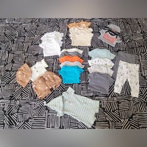 24 items(boys) 0-3 mos used but in good condition onesies, pants, and sets